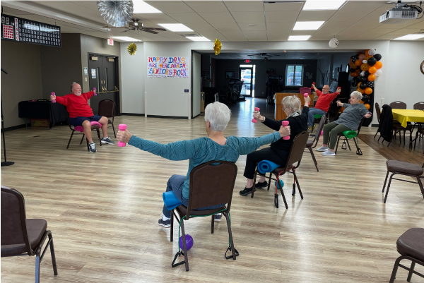 Picture of 4 men and 1 woman exercising at the  Senior Center